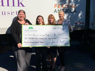 Greylock Employee Community Giveback Program (GECGP) raised $1,360 for the Food Bank of Western Massachusetts. (left to right) Greylock’s Nikki Jannicelli, Marissa Kirchner, Jean Noel, and Heather Clark Corporate Relations Manager, Food Bank of Western Massachusetts.